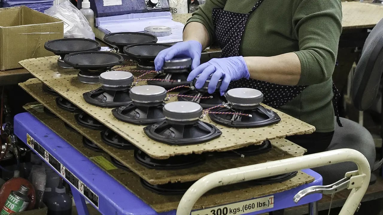 MISCO employee prepping loudspeaker for testing