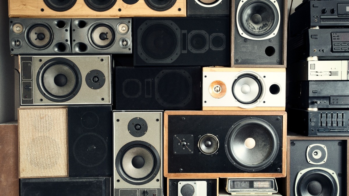 variety of speaker enclosure types stacked on one another in tetris shape - speaker enclosure design