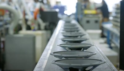 loudspeakers on an assembly line for an OEM audio solution